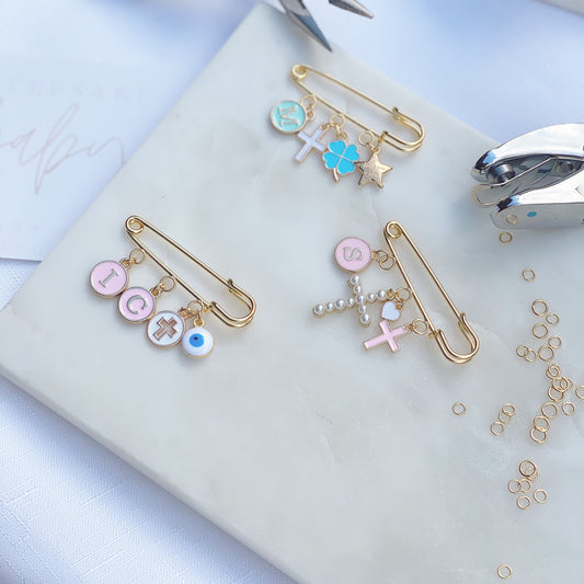 WHITE ROUND MINI CROSS CHARM